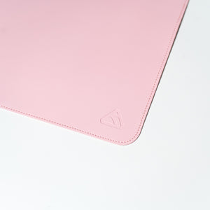 Pink leather desk mat with Ryskape logo